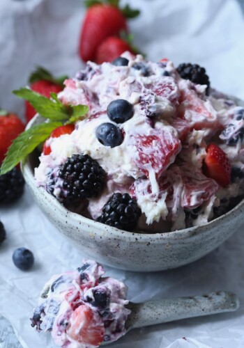 Berry Ambrosia Salad served in a white bowl.