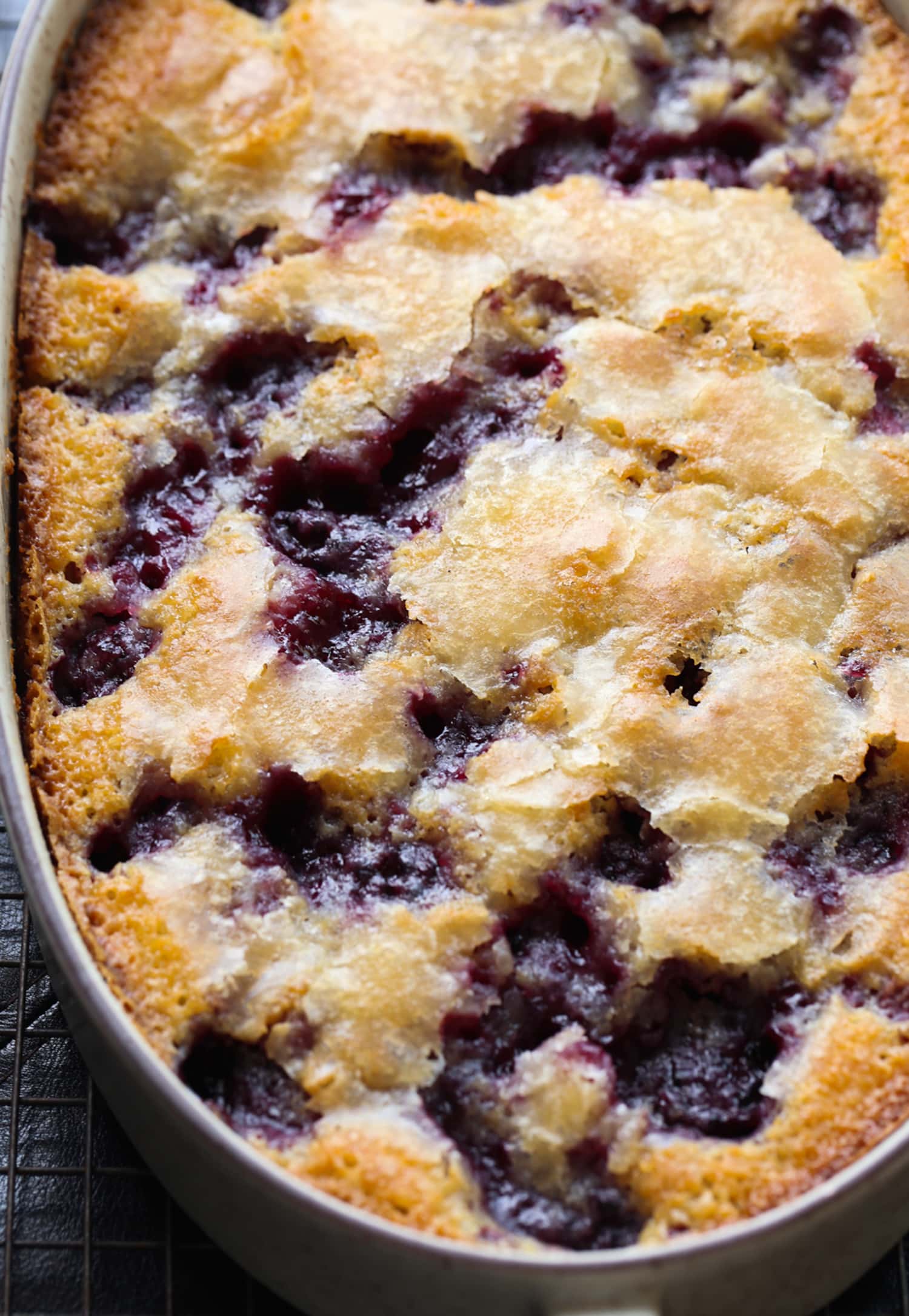Blackberry cobbler in a baking dish fresh out of the oven