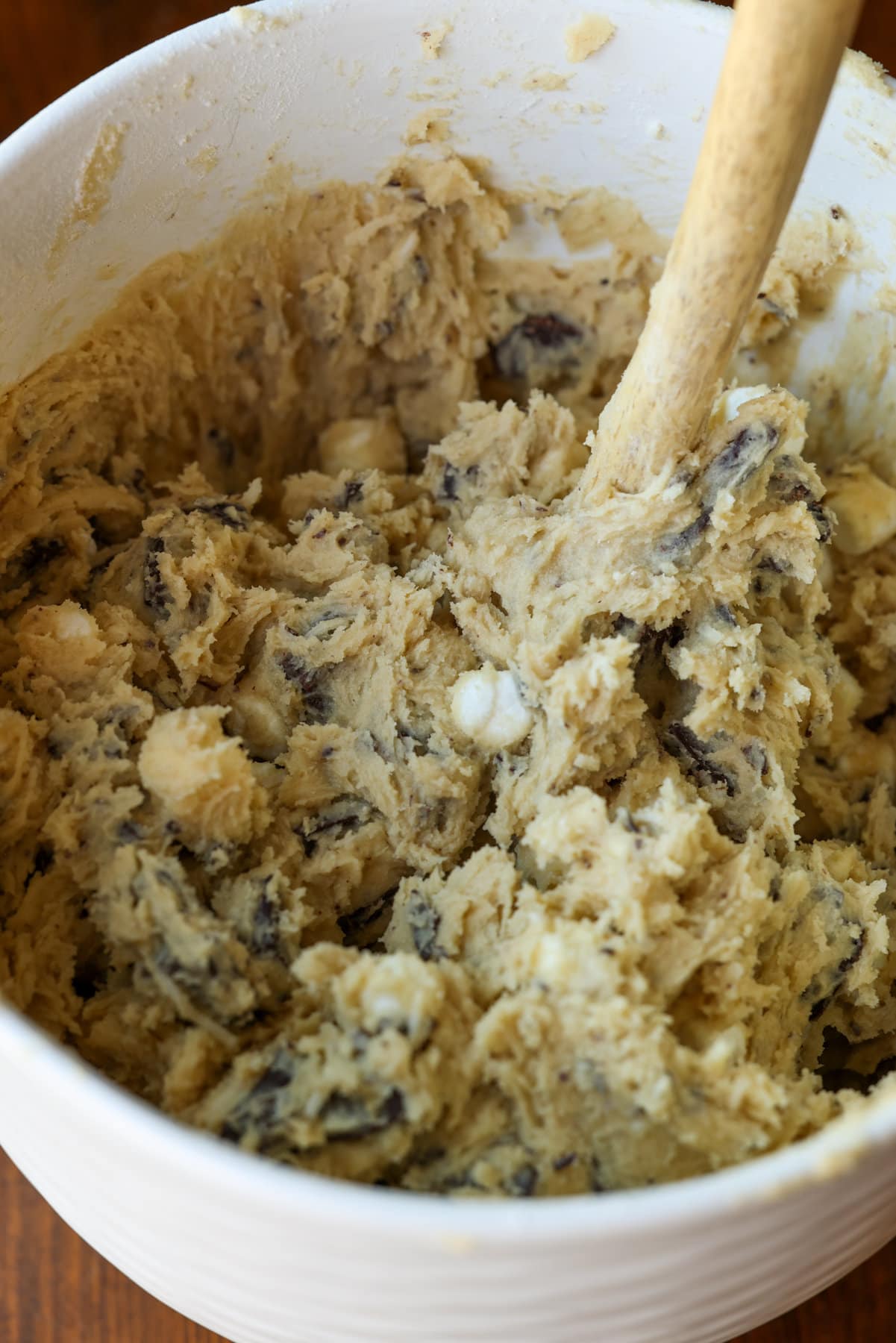 Blondie recipe cookie dough in a white ceramic mixing bowl