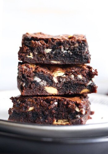 Bombshell Oreo Brownies stacked on a plate