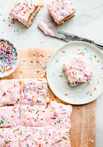 Cake Batter Blondies topped with frosting and sprinkles