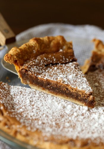 Chess Pie being served dusted in powdered sugar