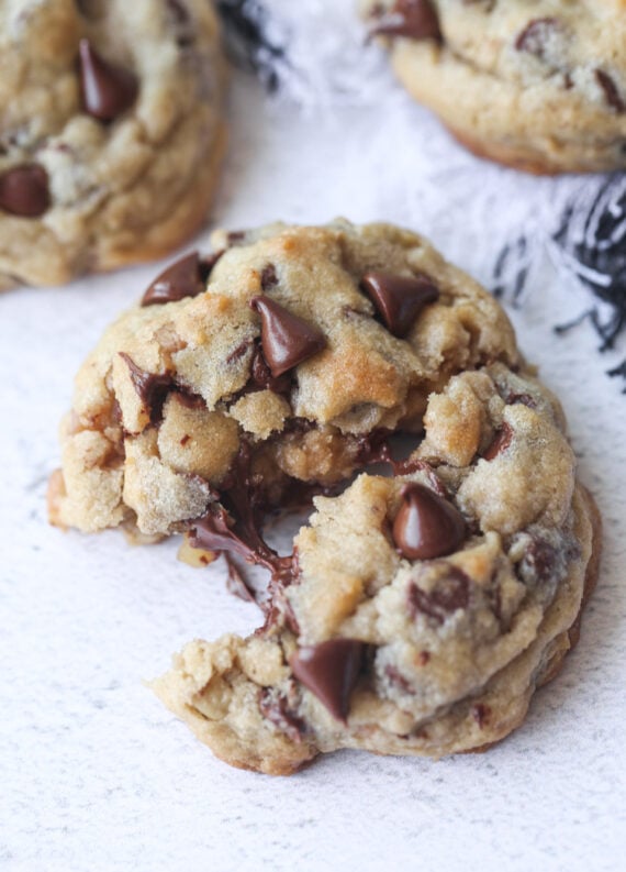 Thick Cookie broken in half with gooey melted chocolate