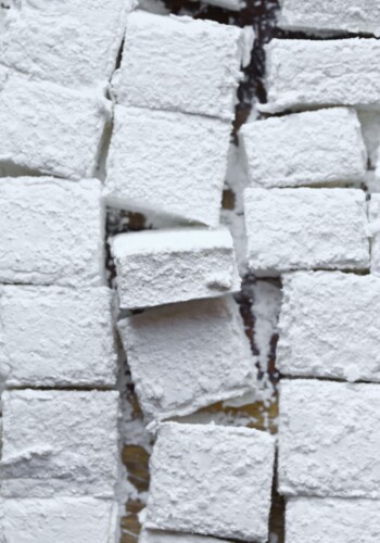 A Bunch of Square Homemade Marshmallows on a Wooden Surface