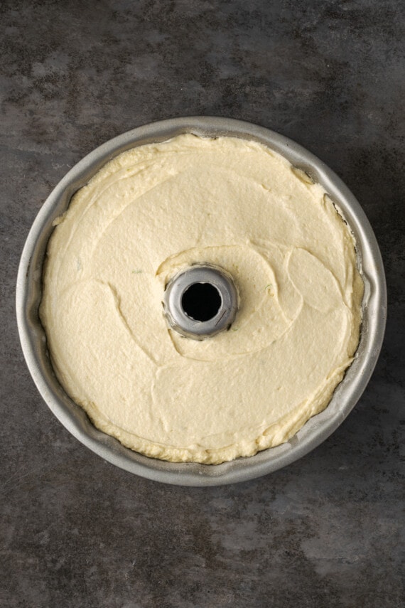 Overhead view of Key lime pound cake batter inside a bundt pan.