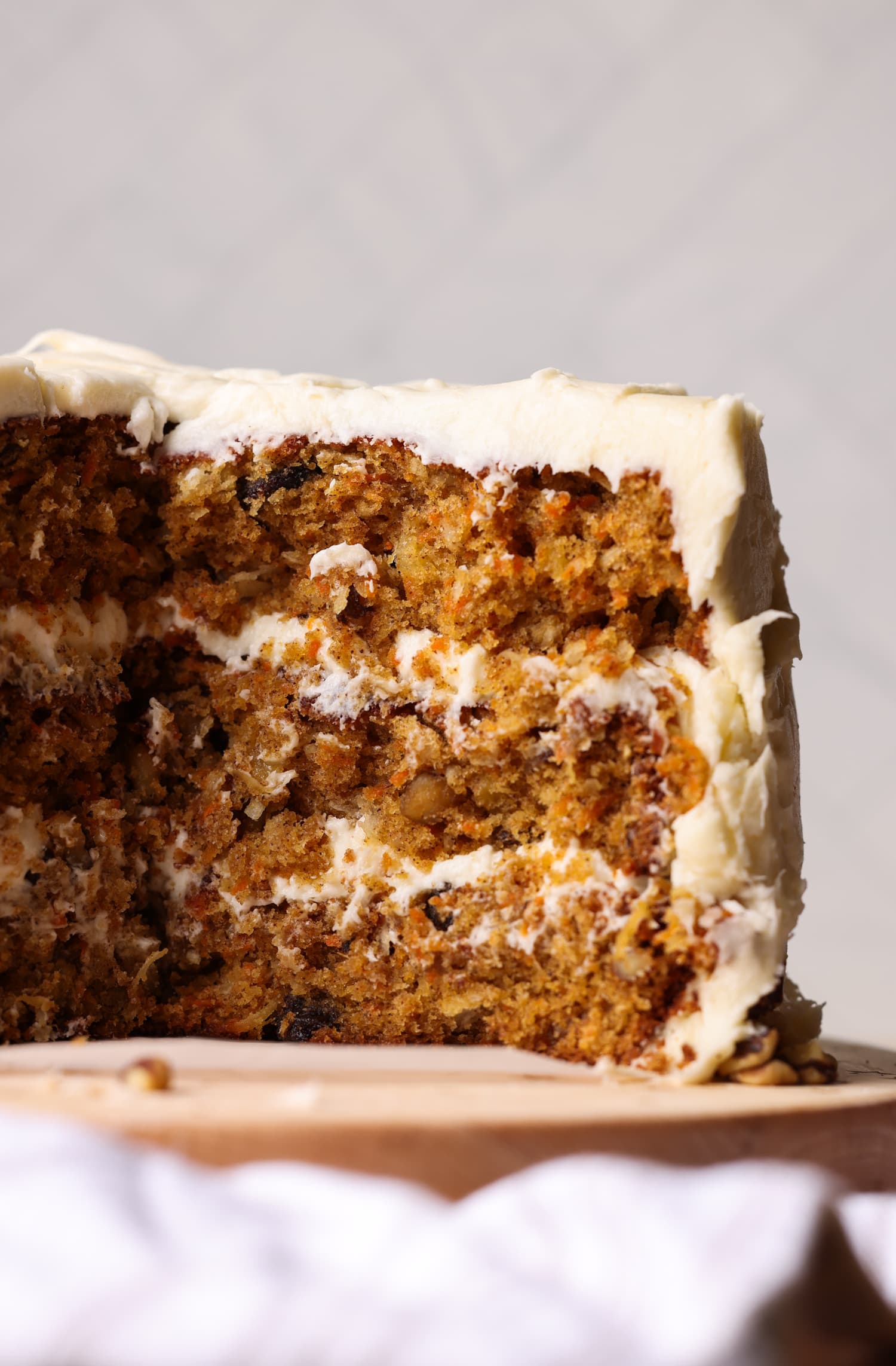 a whole layered carrot cake sliced