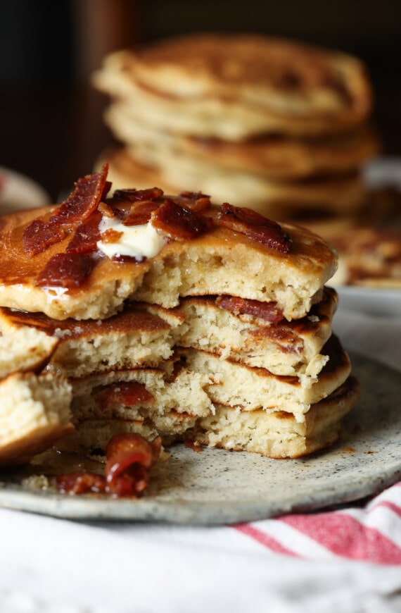 Maple Bacon Pancakes on a plate cut into showing the interior