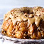 Pull Apart Monkey Bread with praline icing on a platter
