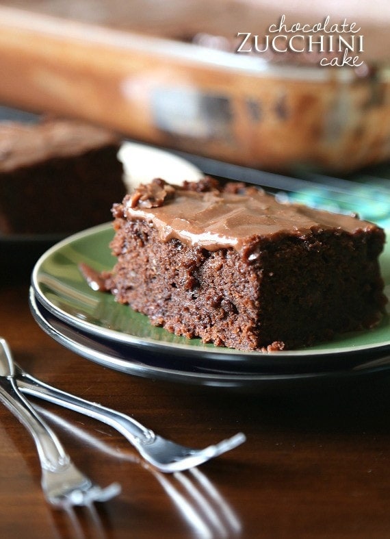 Chocolate Zucchini Cake...a rich , dense chocolate cake made with shredded zucchini. It's topped with a poured chocolate frosting that melts right into the cake!
